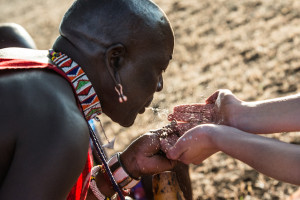 Pouring of milk as part of the traditional Maasai blessing