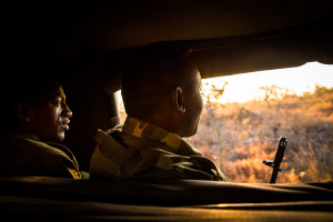 Rangers in vehicle on search for Bahati the rhino.