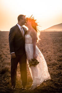 Amber and David in front of the setting sun