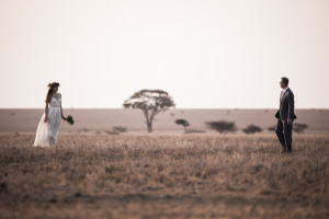 Amber and David walking across the plains, Chyulu Hills, Kenya